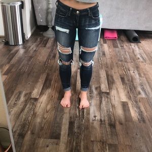 Heavily distressed American eagle jeans